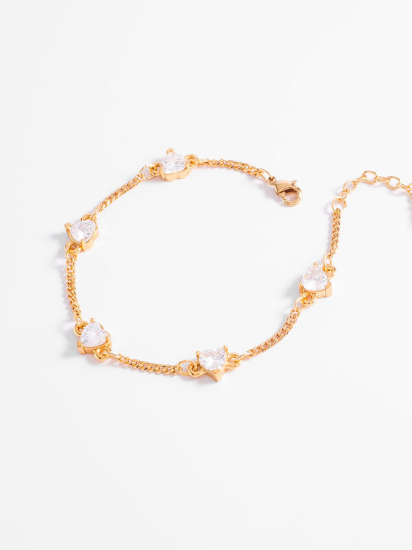 65696-O-20-CS Pulsera con baño de oro y detalles en forma de Corazón